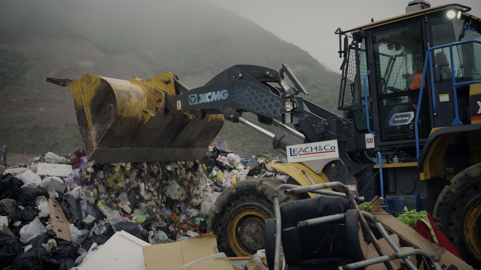 Leach & Co's electric loader at work on the landfill. 